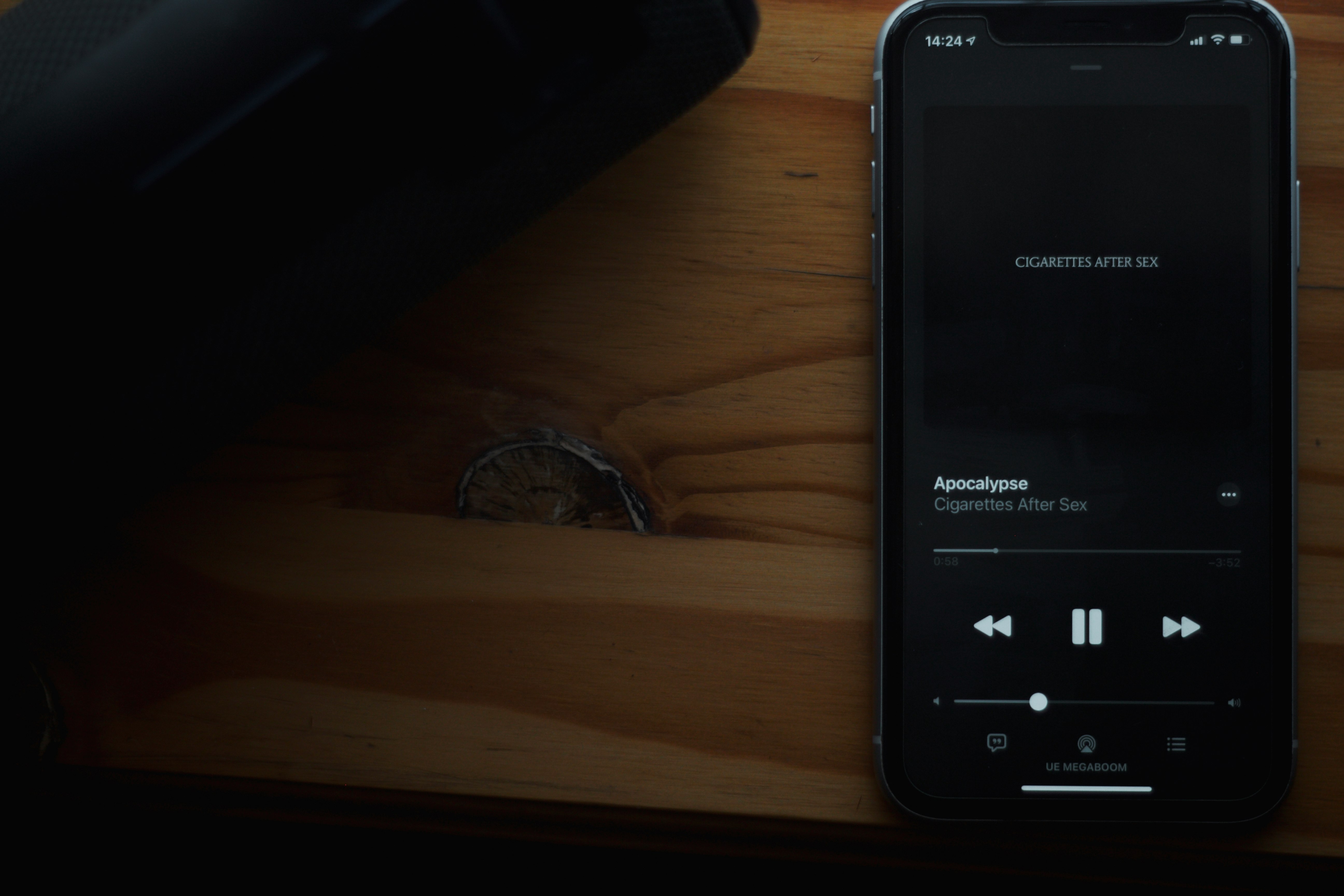 black android smartphone on brown wooden table